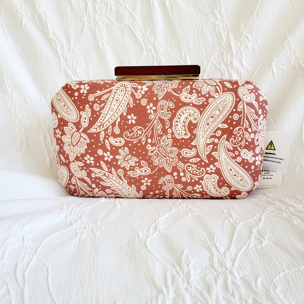 Francesca's Print Clutch in Orange and White